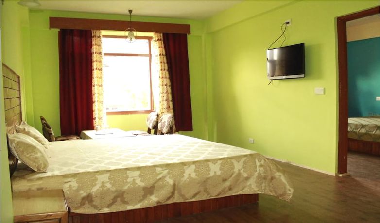 Imagen de la habitación del Hotel Zarim Manali. Foto 9