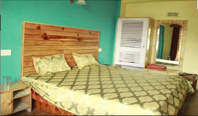 Imagen de la habitación del Hotel Zarim Manali. Foto 11