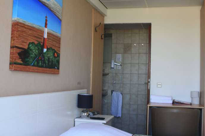 Imagen de la habitación del Hotel Zee en Duin. Foto 18