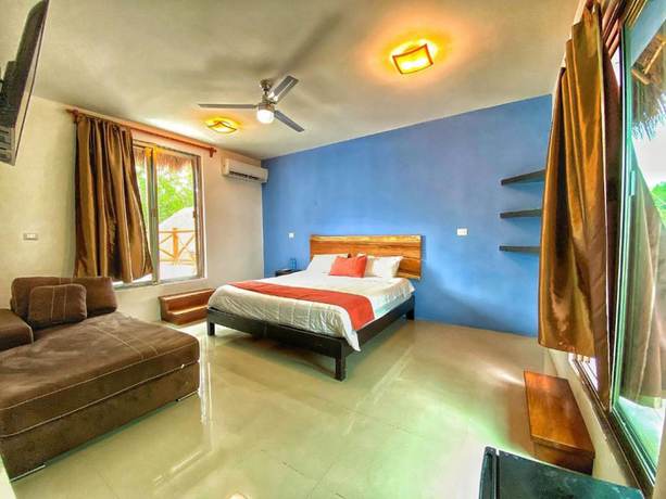 Imagen de la habitación del Hotel Zelune Luxury Lagoon Resort Bacalar Adults only. Foto 6
