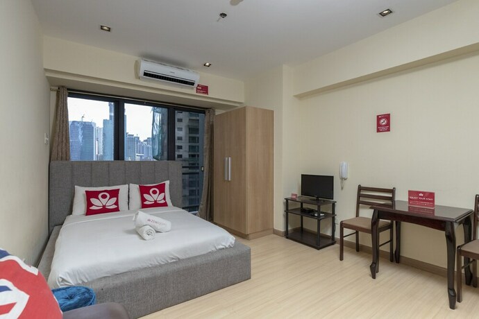 Imagen de la habitación del Hotel Zen Home Knightsbridge Residences Makati. Foto 6