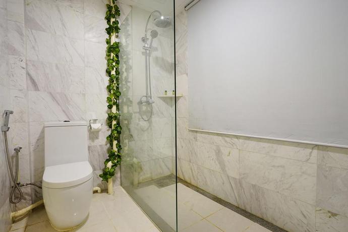 Imagen de la habitación del Hotel Zen Rooms Changi Village. Foto 4