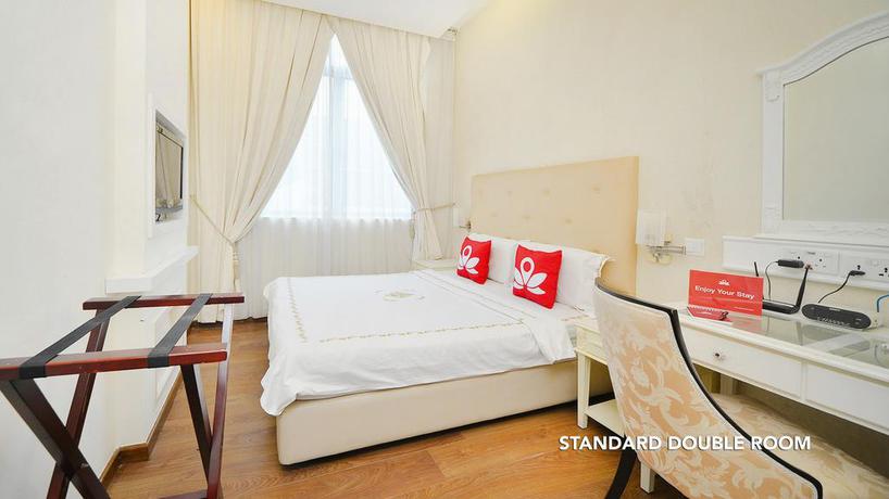 Imagen de la habitación del Hotel Zen Rooms Clarke Quay. Foto 4