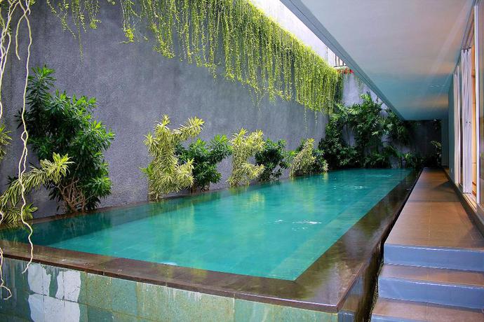 Imagen de la piscina del Hotel Zen Rooms Patra Kuningan Syariah. Foto 17