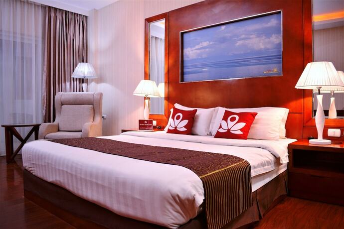 Imagen de la habitación del Hotel Zen Rooms Sunlight Palawan. Foto 4