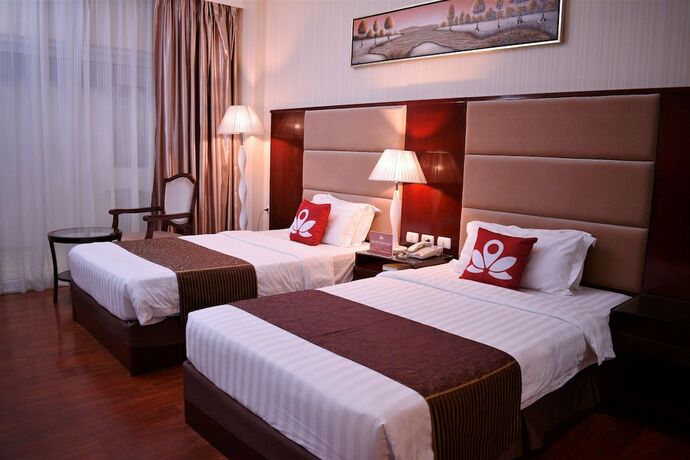 Imagen de la habitación del Hotel Zen Rooms Sunlight Palawan. Foto 10