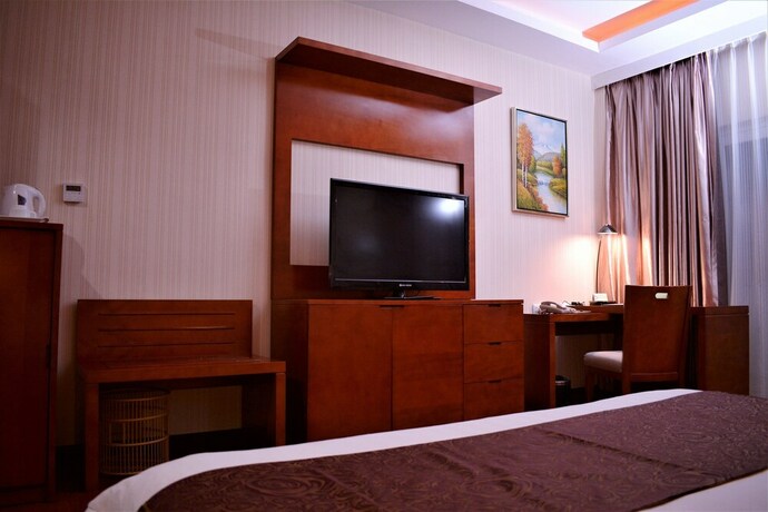 Imagen de la habitación del Hotel Zen Rooms Sunlight Palawan. Foto 11
