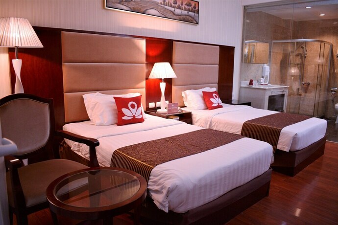 Imagen de la habitación del Hotel Zen Rooms Sunlight Palawan. Foto 13