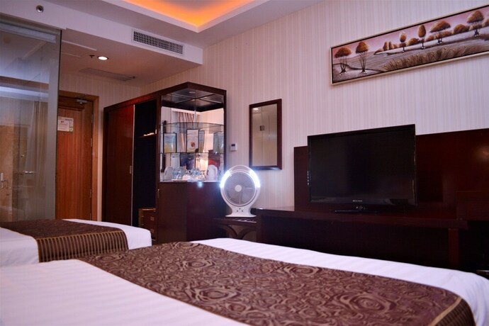 Imagen de la habitación del Hotel Zen Rooms Sunlight Palawan. Foto 15