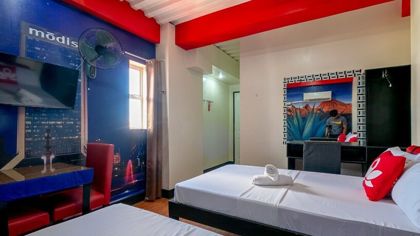 Imagen de la habitación del Hotel Zen Rooms Universal Suite Bed And Breakfast. Foto 2