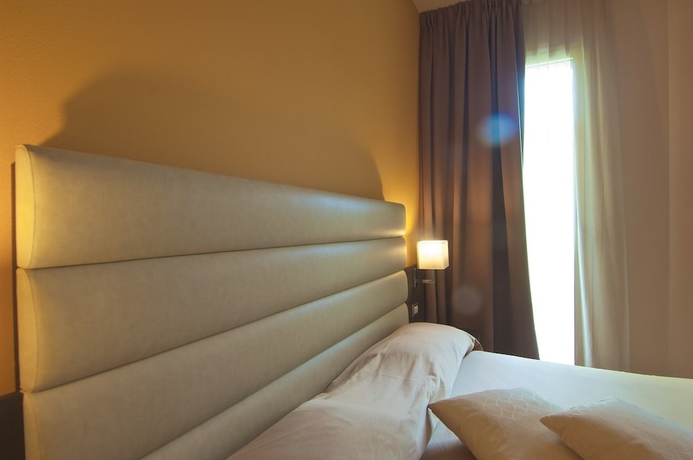 Imagen de la habitación del Hotel Zen Versilia. Foto 13