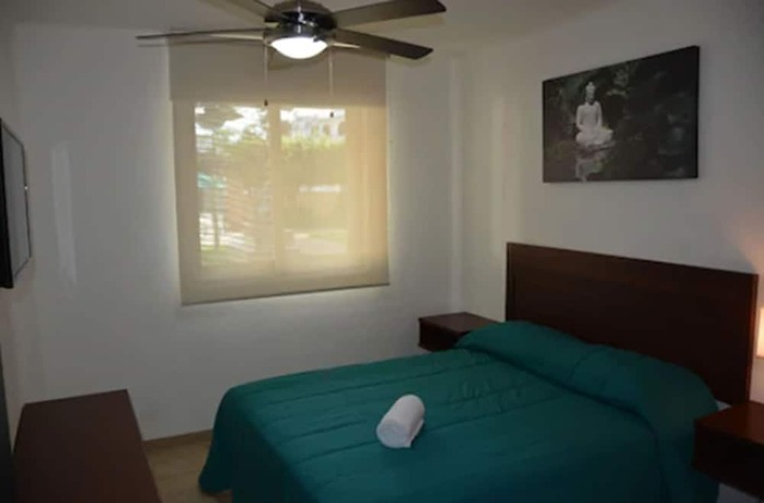 Imagen de la habitación del Hotel ZenHarmony Suites. Foto 13