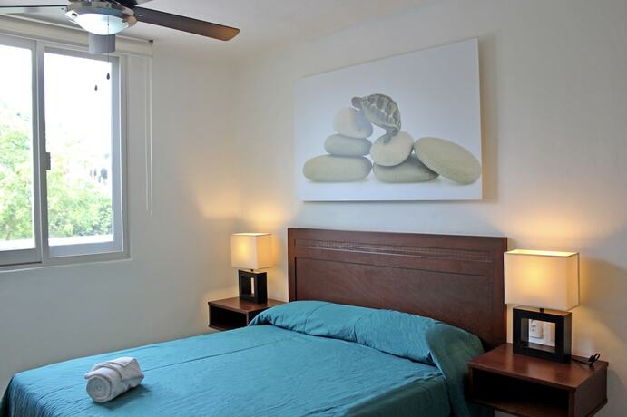Imagen de la habitación del Hotel ZenHarmony Suites. Foto 16