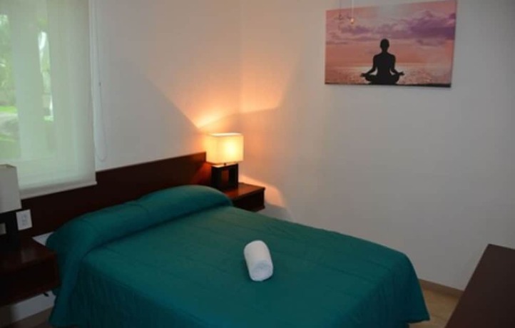 Imagen de la habitación del Hotel ZenHarmony Suites. Foto 17