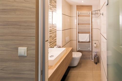 Imagen de la habitación del Hotel Zena Beauty and Shopping Center. Foto 7