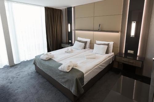 Imagen de la habitación del Hotel Zena Beauty and Shopping Center. Foto 8