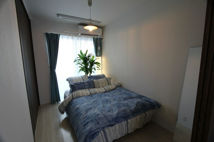 Imagen de la habitación del Hotel Zenan 1. Foto 25
