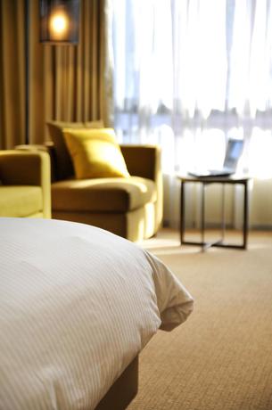 Imagen de la habitación del Hotel Zenda Suites. Foto 15
