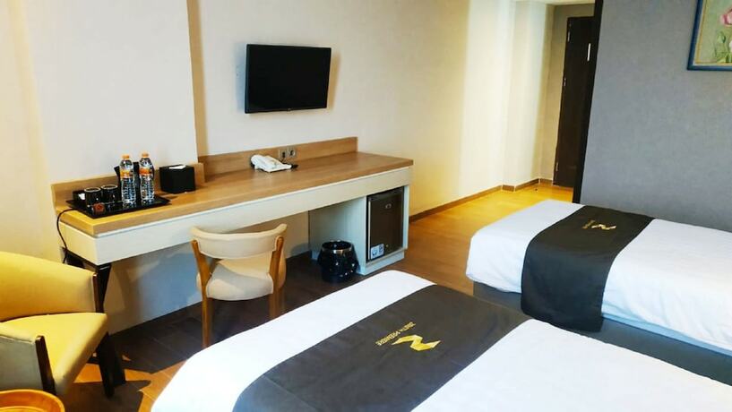 Imagen de la habitación del Hotel Zenith Premiere Baubau. Foto 22