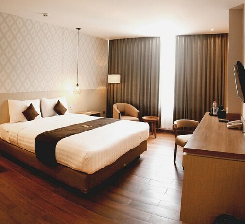 Imagen de la habitación del Hotel Zenith Premiere Baubau. Foto 23