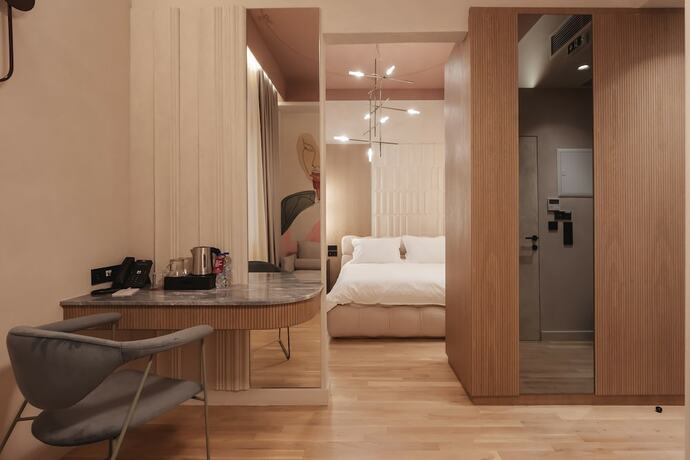 Imagen de la habitación del Hotel Zenith Premium Suites. Foto 11