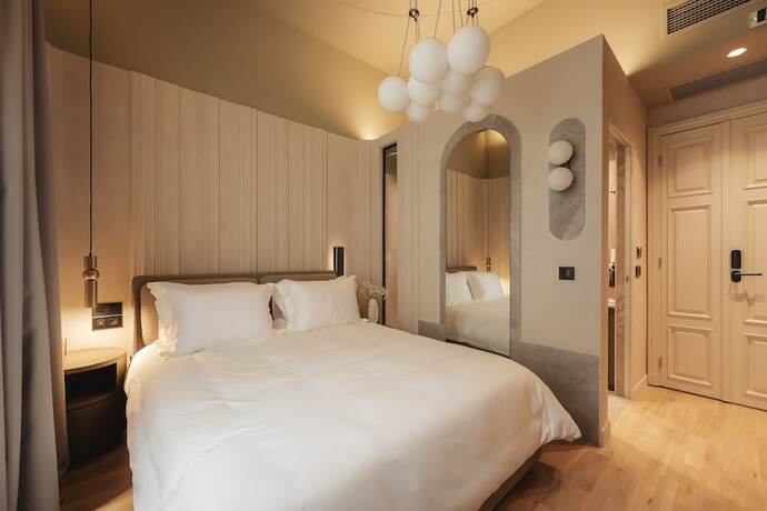 Imagen de la habitación del Hotel Zenith Premium Suites. Foto 13