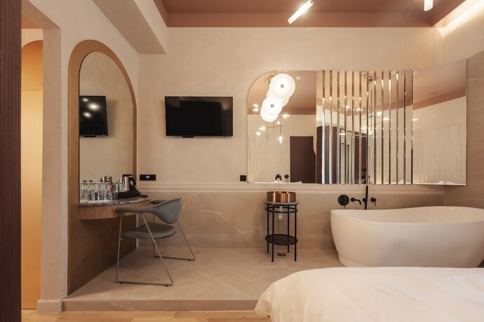 Imagen de la habitación del Hotel Zenith Premium Suites. Foto 15