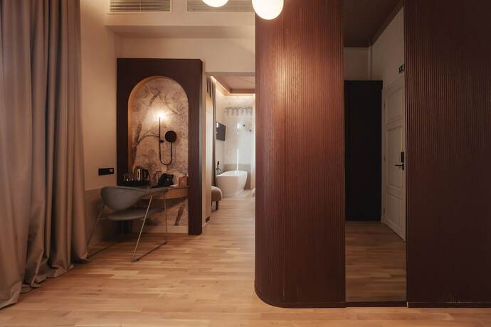 Imagen de la habitación del Hotel Zenith Premium Suites. Foto 16