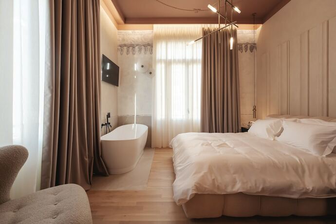 Imagen de la habitación del Hotel Zenith Premium Suites. Foto 19