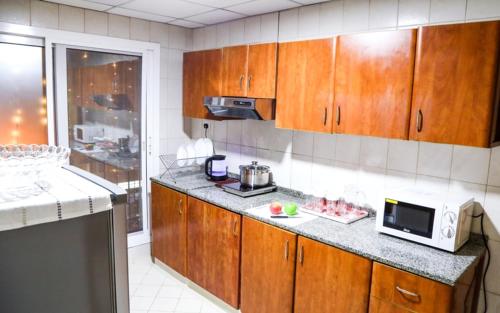 Imagen de la habitación del Hotel Zenith Smart Vacation Homes, Sharjah. Foto 20