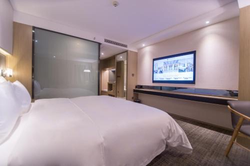 Imagen de la habitación del Hotel Zenith, Xiamen. Foto 5