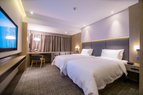 Imagen de la habitación del Hotel Zenith, Xiamen. Foto 8