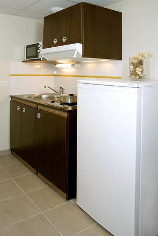 Imagen de la habitación del Hotel Zenitude Hôtel-Résidences Versailles Saint-Cyr-l'Ecole. Foto 5