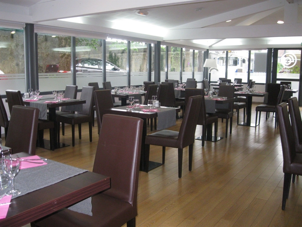 Imagen del bar/restaurante del Hotel Zenitude - Résidences Les Jardins De Lourdes. Foto 2