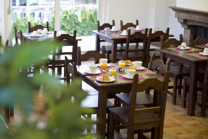 Imagen del bar/restaurante del Hotel Zenitude - Résidences Les Terrasses Du Lac. Foto 2