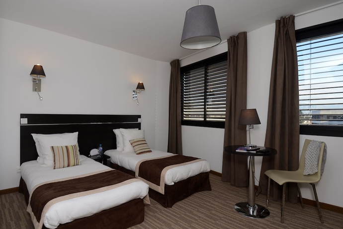 Imagen de la habitación del Hotel Zenitude Swiss Apparthotels. Foto 8