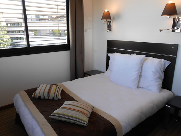 Imagen de la habitación del Hotel Zenitude Swiss Apparthotels. Foto 9