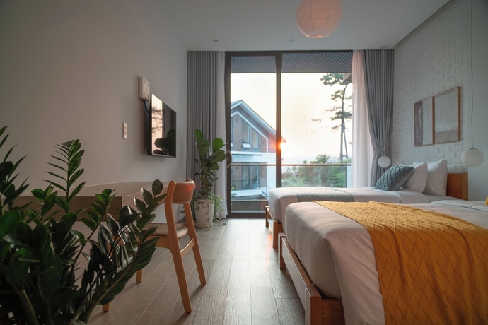 Imagen de la habitación del Hotel Zenora Hillside Garden. Foto 4