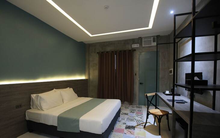 Imagen de la habitación del Hotel Zenvea Hotel Coron. Foto 14