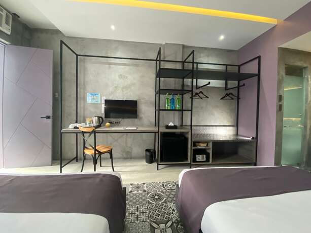 Imagen de la habitación del Hotel Zenvea Hotel Coron. Foto 15