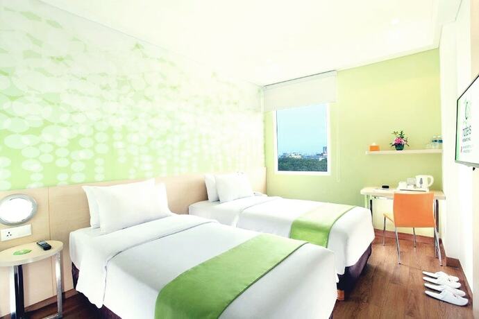 Imagen de la habitación del Hotel Zest Airport Jakarta. Foto 19