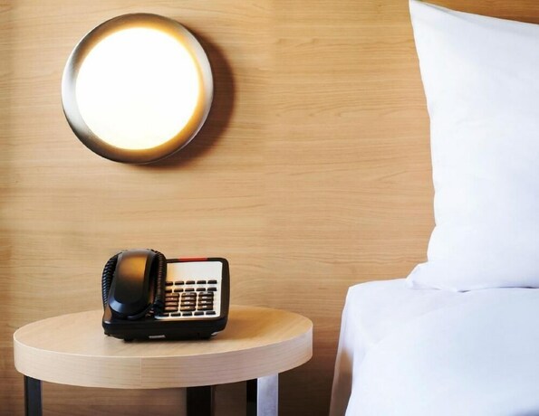 Imagen de la habitación del Hotel Zest Airport Jakarta. Foto 22