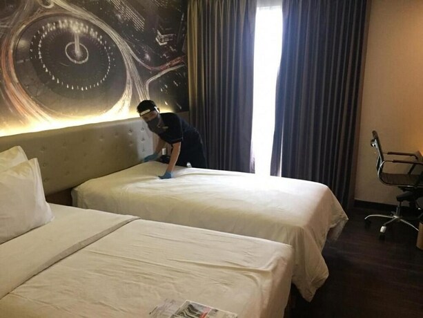 Imagen de la habitación del Hotel Zest Airport Jakarta. Foto 23