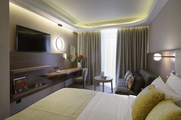 Imagen de la habitación del Hotel Zeus Essence Wyndham Athens Residence. Foto 11