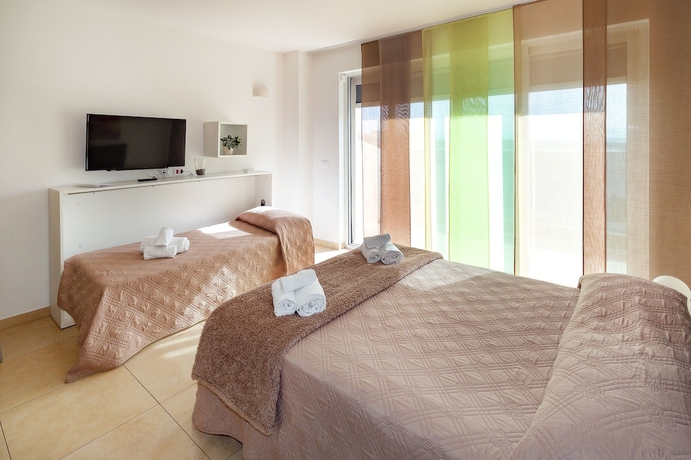 Imagen de la habitación del Hotel Zeus Residence. Foto 10