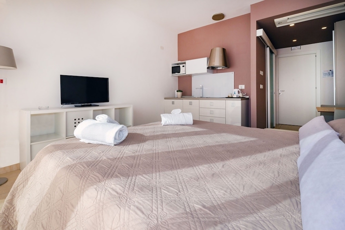 Imagen de la habitación del Hotel Zeus Residence. Foto 14