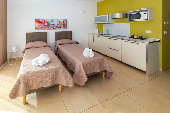 Imagen de la habitación del Hotel Zeus Residence. Foto 15