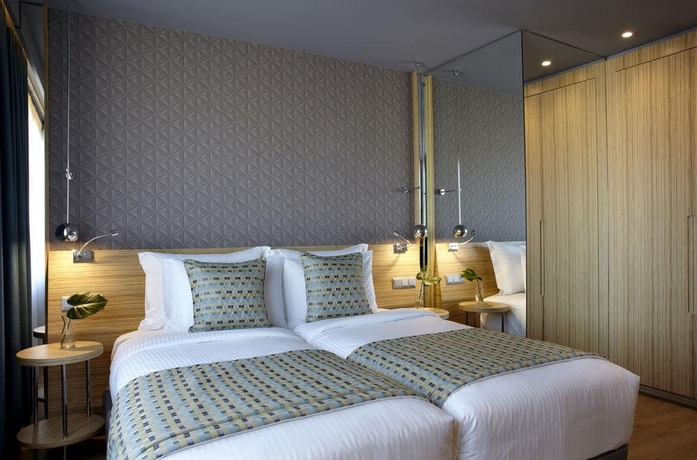 Imagen de la habitación del Hotel Zeus Wyndham Grand Athens. Foto 6