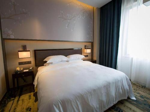 Imagen general del Hotel Zhangjiagang Guomao, Yanghe. Foto 11