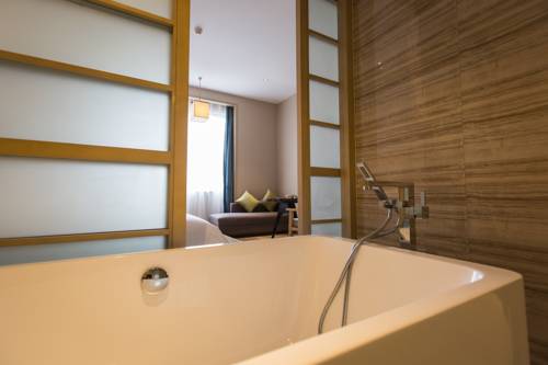 Imagen de la habitación del Hotel Zhangjiagang Guomao, Zhangjiagang. Foto 3